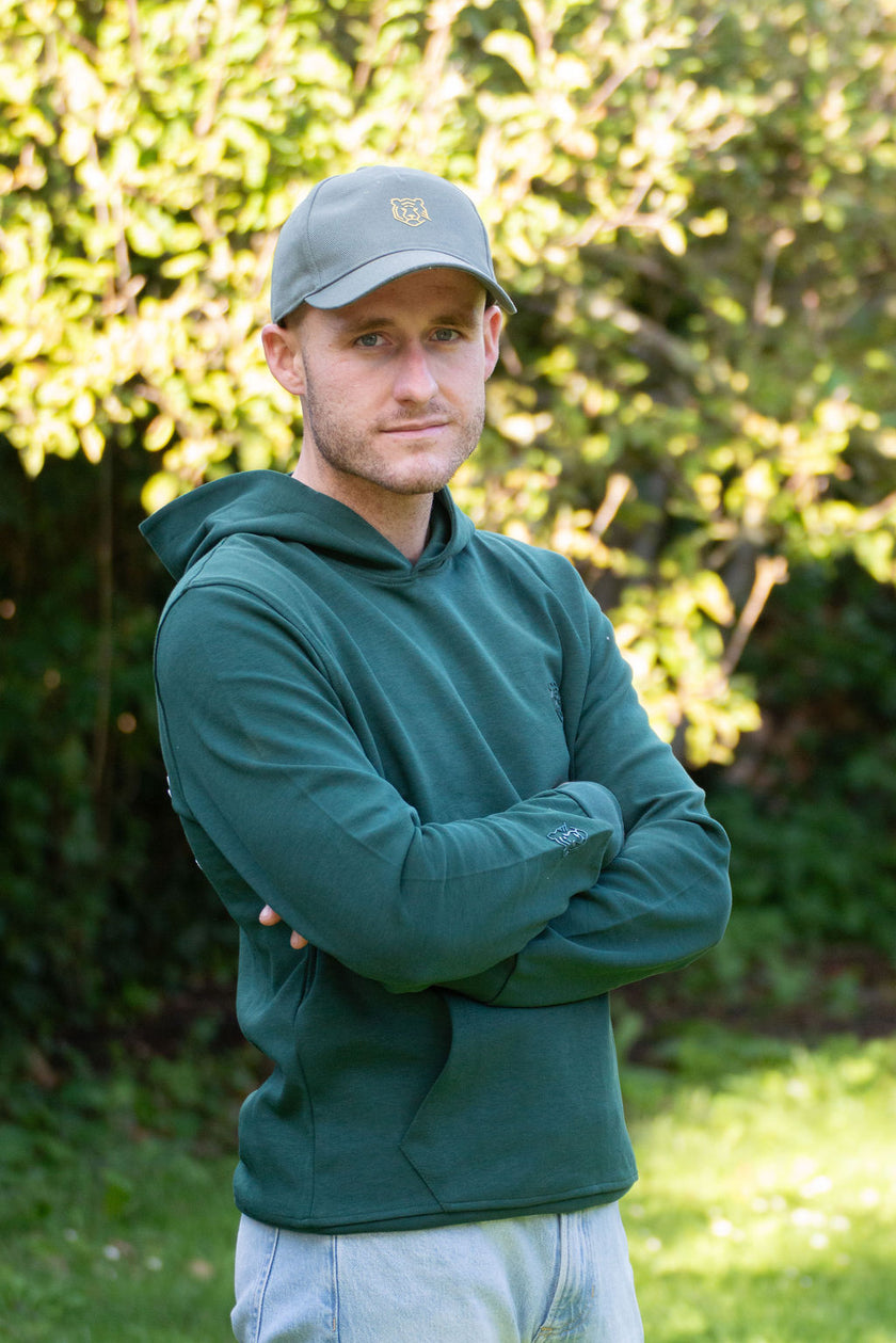 GolfRebels Talk Birdie to Me golf hoodie heren Masters Green – oversized vintage pasvorm met GolfRebels logo, gedragen buiten
