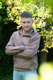 GolfRebels Talk Birdie to Me golf hoodie heren Terracotta – oversized vintage pasvorm met GolfRebels logo, gedragen buiten